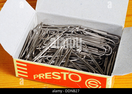 Paperclips in a cardboard box. Stock Photo