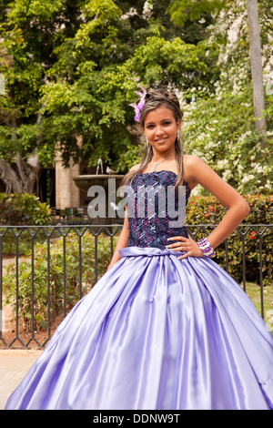 young girl dressed for the Quinceanera or Quince, the celebration of a girl's fifteenth birthday in Havana, Cuba, Caribbean Stock Photo