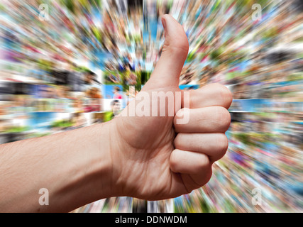 Social media like concept with hand in LIKE or thumbs up sign Stock Photo