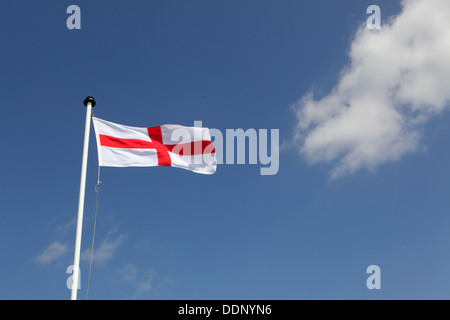 Flag flying to commemorate, St Georges Day, Suffolk, UK Stock Photo