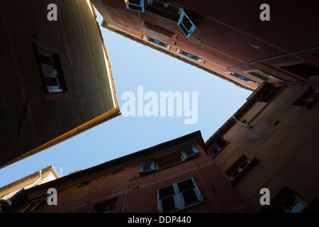 Upward view of old Mediterranean buildings in Liguria, Italy Stock Photo