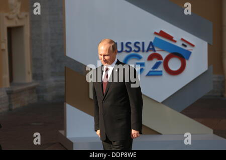 St. Petersburg, Russia. 05th Sep, 2013. Russian President Vladimir Putin looks down as he waits to welcome US President Barack Obama for the G20 summit at the Constantine Palace in St. Petersburg, Russia, 05 September 2013. The G20 summit takes place from 05 to 06 September. Photo: Kay Nietfeld/dpa/Alamy Live News Stock Photo