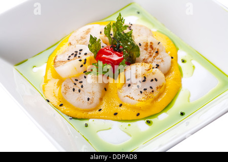 sea scallops with sauce. Stock Photo