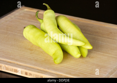 banana peppers on a cutting board Stock Photo