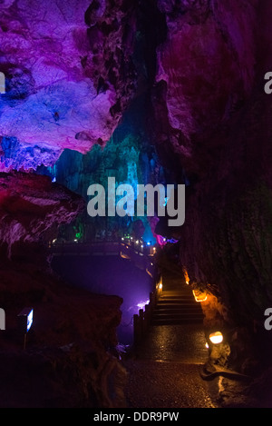 Display of colorful lights in a cave, Assembling Dragon Cave, Yangshuo, Guilin, Guangxi Province, China Stock Photo