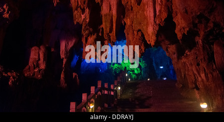 Display of colorful lights in a cave, Assembling Dragon Cave, Yangshuo, Guilin, Guangxi Province, China Stock Photo