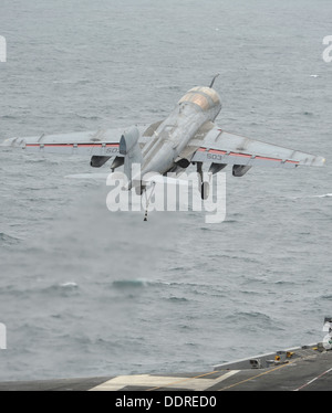 An EA-6B Prowler assigned to the Gray Wolves of Electronic Attack Squadron (VAQ) 142 launches off the flight deck of the aircraft carrier USS Nimitz (CVN 68). The Nimitz Carrier Strike Group is deployed to the U.S. 5th Fleet area of responsibility conduct Stock Photo