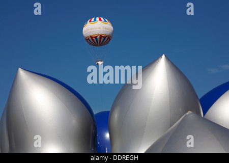 Bournemouth Eye Balloon with part of the exterior of the Amococo Luminarium at Bournemouth in September Stock Photo
