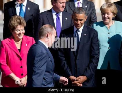 St. Petersburg, Russia. 06th Sep, 2013. Brazilian President Dilma Rousseff (L-R), Russian President Vladimir Putin, British Prime Minister David Cameron, US President Barack Obama and German Chancellor Angela Merkel take their places for the family photo at the G20 summit in St. Petersburg, Russia, 06 September 2013. The G20 summit takes place from 05 to 06 September. Photo: Kay Nietfeld/dpa/Alamy Live News Stock Photo