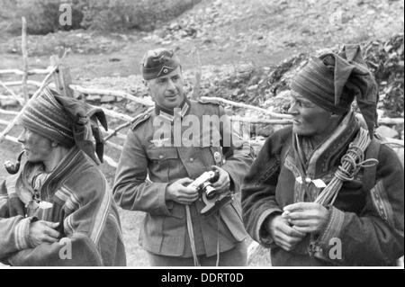 Second World War / WWII, Finland, communications zone, German soldier and two Sami people, Lapland, early 1942, Additional-Rights-Clearences-Not Available Stock Photo