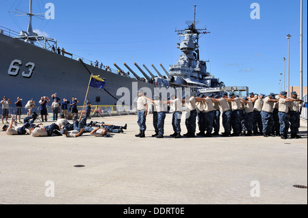 Chief Selectees from various commands around Navy Region Hawaii participate in the Inaugural Chief Petty Officer (CPO) Pride Day Hawaii Marching and Cadence Competition, at the Battleship Missouri Memorial located on Ford Island, Joint Base Pearl Harbor-H Stock Photo