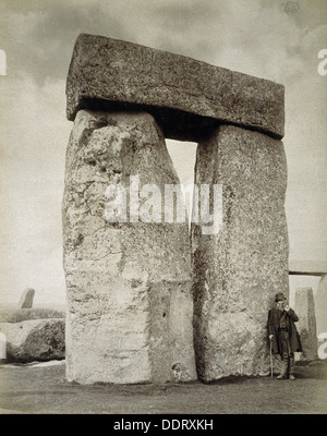 A shepherd posing at Stonehenge on Salisbury Plain, Wiltshire, 19th century. Artist: Unknown Stock Photo