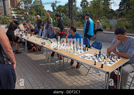 Bournemouth, UK 6 September 2013. Charity Simultaneous Chess Exhibition in Bournemouth Town Square with Meri Grigoryan, a Woman FIDE Master who is a West London Chess Club member and an ECF Accredited Coach. Meri plays up to 10 players at a time, raising money for CANCER Research UK Credit:  Carolyn Jenkins/Alamy Live News Stock Photo