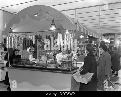 New Co-op central butcher's department, Barnsley, South Yorkshire, 1957. Artist: Michael Walters Stock Photo