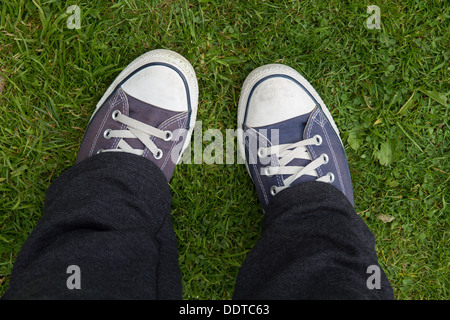 Feet in trainers Stock Photo