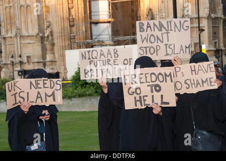 London, UK. 06th Sep, 2013. Muslim women outside the Houses of Parliament wearing Burkas protest against attempts to ban the garment. MPs in Commons are currently debating Philip Hollobone's bill which would make it illegal to wear the clothing. Credit:  Pete Maclaine/Alamy Live News Stock Photo