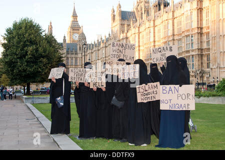 London, UK. 06th Sep, 2013. Muslim women outside the Houses of Parliament wearing Burkas protest against attempts to ban the garment. MPs in Commons are currently debating Philip Hollobone's bill which would make it illegal to wear the clothing. Credit:  Pete Maclaine/Alamy Live News Stock Photo