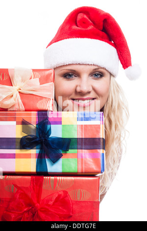 Beautiful smiling Christmas woman with many presents, isolated on white background. Stock Photo