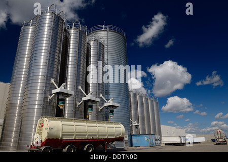 Large stainless steel tanks and trucks containing plastic ingredients for extrusion industry Vaughan Canada Stock Photo