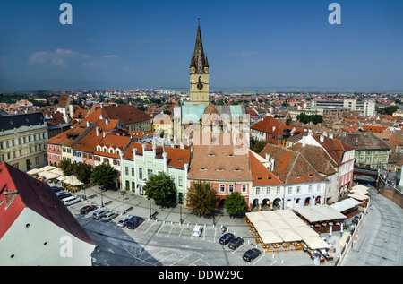 View of Small Square and Evangelic Church of Sibiu, taken from Council tower, saxon scenery from Transylvania in Romania. Stock Photo