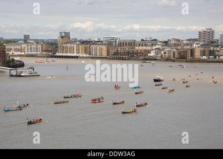 London, UK, 7 September 2013: Competitors in the annual Thames Great River Race approach Limehouse, east London. More than 300 crews are taking part in the annual 21-mile river marathon from London Docklands to Ham in Surrey. Credit:  Sarah Peters/Alamy Live News Stock Photo
