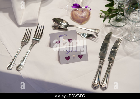 wedding place setting for bride and groom Stock Photo