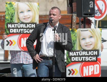 Weimar, Germany. 07th Sep, 2013. Patrick Wieschke, regional chairman of the NPD of the state Thuringia, speaks during an election campaign event of the extreme right-wing party in Weimar, Germany, 07 September 2013. About 250 people demonstrated against the NPD event with about 20 people. Photo: CANDY WELZ/dpa/Alamy Live News Stock Photo