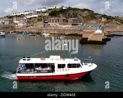 Fowey to Mevagissey ferry leaving Mevagissey Harbour, Cornwall, UK 2013 Stock Photo