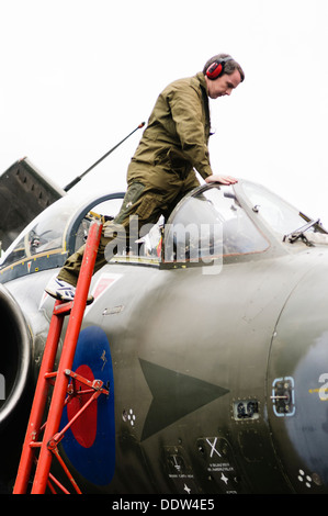 Pilot climbs into a Blackburn Buccaneer XV361 Stock Photo