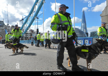 Tower Bridge, London, UK. 7th September2013.  A heavy Police presence as the EDL march from Tower Bridge towards Aldgate. Credit:  Matthew Chattle/Alamy Live News Stock Photo