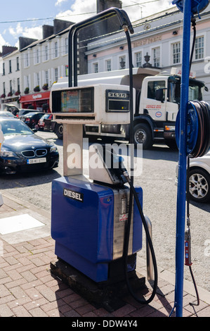 Petrol pump on the footpath outside a shop in an Irish town Stock Photo