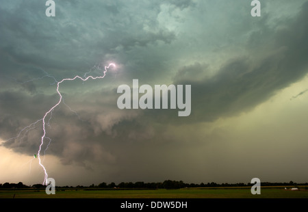 Thunder and lightning at the end of a hot and moistly day in the Netherlands Stock Photo