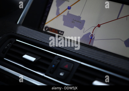 Vertical shot of a navigation system in a car Stock Photo