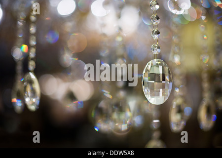Close-up of a cut glass chandelier and the resultant abstract light reflections and refractions. Stock Photo
