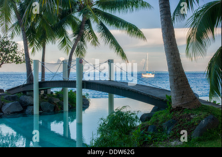 Bridge over infinity pool at the Intercontinental Tahiti hotel. Tahiti. French Polynesia Stock Photo