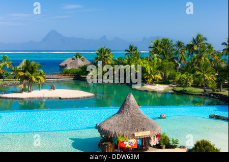 Pool at the Intercontinental Tahiti hotel with Moorea in background Tahiti. French Polynesia Stock Photo