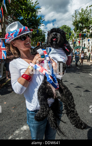 A union jack clad woman and her dog Stock Photo