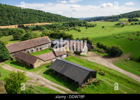 View from the South Tower at Stokesay Castle across Shropshire with a farm in the foreground.