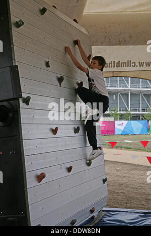 Stratford, UK. 7th September 2013. Children enjoy the rock climbing wall at the National Paralympic Day Credit: Keith larby/Alamy Live News Stock Photo