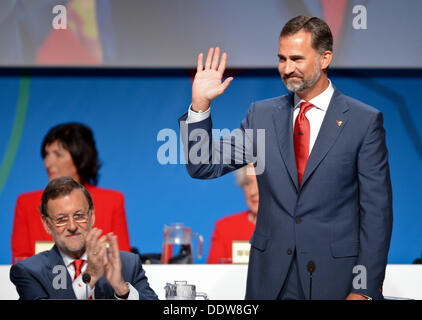 Buenos Aires, Argentina. 07th Sep, 2013. Spain's Crown Prince Felipe (R) waves next to Spain's Prime Minister Mariano Rajoy during the Madrid 2020 presentation to the 125th IOC Session at the Hilton hotel in Buenos Aires, Argentina, 07 September 2013. The International Olympic Committee (IOC) will elect the host city for the 2020 Olympic Games among the three candidate cities of Istanbul, Tokyo and Madrid. Photo: Arne Dedert/dpa/Alamy Live News