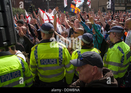 London, UK. 07th Sep, 2013. EDL activists applaud the speeches at a rally  outside Aldgate East station on the edge of the borough of Tower Hamlets. Credit:  Paul Davey/Alamy Live News Stock Photo