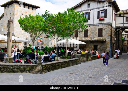 Cafe Society,drinking,eating adjacent old city walls,enjoying the good weather, Pamplona,Iruna,Navarre,Spain Stock Photo