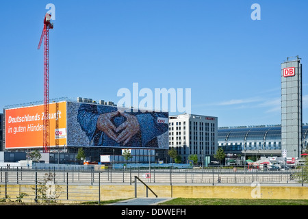 Big Angela Merkel triangle poster in Berlin Stock Photo