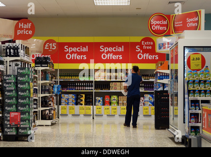 Special offers signs in a Tesco store, UK Stock Photo