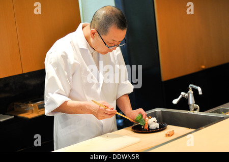 A Japanese chef at work. Stock Photo