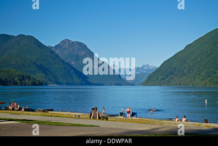 People enjoying beautiful Alouette Lake, beach, and mountains in British Columbia, Canada. Golden Ears Provincial Park. Stock Photo