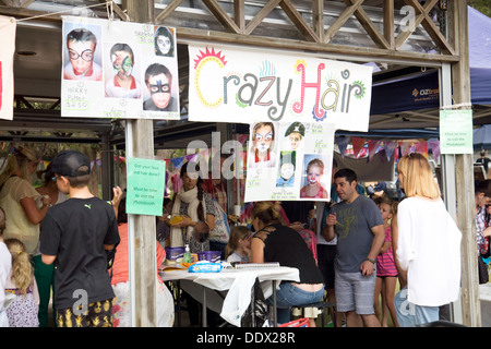 Australian primary school annual fete and carnival in Avalon,Sydney with a crazy hair stall pictured,Australia Stock Photo