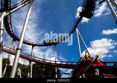 The Demon Rollercoaster ride at Tivoli Gardens amusement park, Copenhagen, Denmark Stock Photo