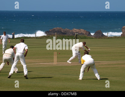 Batsman being bowled out, Amateur Cricket match, Bude, Cornwall, UK 2013 Stock Photo