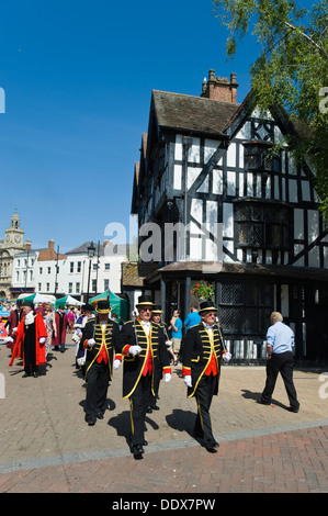 Mayor's civic procession walking past The Old House at High Town in Hereford Herefordshire England UK